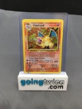 1999 Pokemon Base Set Unlimited #4 CHARIZARD Holofoil Rare Vintage Trading Card from Collection