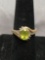 Oval Faceted 8x6mm Peridot Center w/ Round Faceted Diamond Accents Bypass Sterling Silver & 10Kt