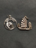 Lot of Two Sterling Silver Charms, One Chinese Themed Fishing Boat & One City of Calgary