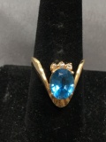 Oval Faceted 10x8mm Blue Topaz Center w/ Six Round Diamond Accents 14kt Gold Bypass Ring Band - 6