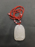 Asian Style Hand-Carved Buddha Themed Oval 48mm Tall 32mm Wide White Jade Pendant w/ Red Silk Cord