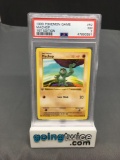 PSA Graded 1999 Pokemon Base Set 1st Edition Shadowless #52 MACHOP Trading Card - NM 7