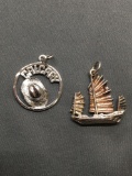 Lot of Two Sterling Silver Charms, One Chinese Themed Fishing Boat & One City of Calgary