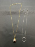 Lot of Two Fashion Pendants, One Gold-Tone Faberge Egg Themed Opening Locket Pendant w/ Chain &