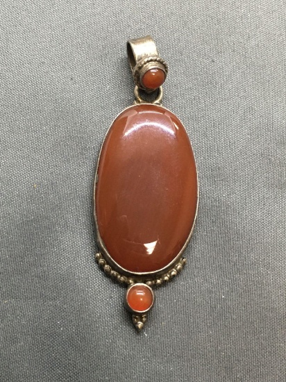 Oval 33x20 Polished Orange Cabochon Center Sterling Silver Pendant