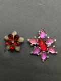 Lot of Two Starburst Style Fashion Brooches, One Glass & One Resin