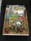 Vintage Teenage Mutant Ninja Turtles Toy and Comic Book Collection with Action Figures