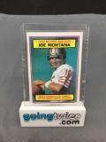 1983 Topps Football #4 JOE MONTANA San Francisco 49ers Vintage Trading Card