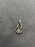 Round Faceted Diamond Featured 20mm Tall 10mm Wide Knot Themed Sterling Silver Pendant