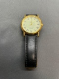 Round 25mm Face Gold-Tone Bezel Night Glow Quartz Stainless Steel Watch w/ Leather Strap