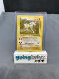 1999 Pokemon Fossil Unlimited #7 HITMONLEE Holofoil Rare Trading Card from Childhood Collection