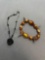 Lot of Two Various Style Fashion Bracelets, One Amber Colored 7in Long Bracelet & One Black Beaded