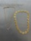 Lot of Two Gold-Tone Fashion Jewelry, One 18in Long Necklace w/ Glass Heart Pendant & One High