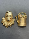 Lot of Two Large Gold-Tone Fashion Brooches, One Flower Water Pot & Masquerade Themed