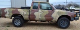 1986 Camo Nissan Ext. Cab 4x4 5speed