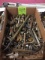 Wrenches, sockets, pry bars, grease guns, large sockets, saw blades, straps, hardware