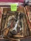 Wrenches, sockets, pry bars, grease guns, large sockets, saw blades, straps, hardware