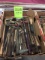Wrenches, sockets, pry bars, grease guns, large sockets, saw blades, straps, hardware