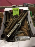 Wrenches, sockets, pry bars, grease guns, large sockets, saw blades, straps, hardware