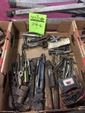 Wrenches, sockets, pry bars, grease guns, large sockets, saw blades, straps, hardware