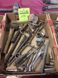 Wrenches, sockets, pry bars, grease guns, large sockets, saw blades, straps, hardware