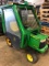 John Deere GT235 Tractor with cab.  Unknown condition