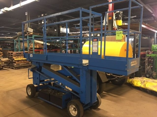 Up-Right-Inc battery powered scissor lift. Model 6300-B, serial 3027, 20 ft height