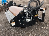 Erskine hydraulic vibratory roller attachment. Like new. Used as a demo unit.