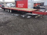Reberland Equipment Co., triple axle equipment trailer.