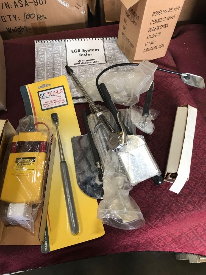 Several magnetic pickup tools, most are NEW, book not included