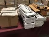 Large assortment of lighting fixtures and exit lights, many are NIB