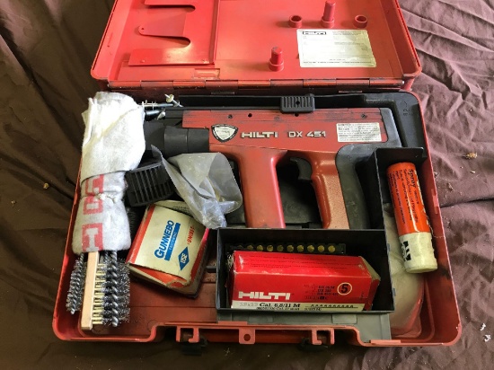 Hilti DX 451 Powder Actuated Nailer, with case and misc supplies