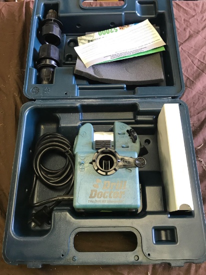 Drill Doctor, with case, powers on