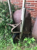 Old Rusty Wheelbarrow, likely a yard ornament at this point in it's life