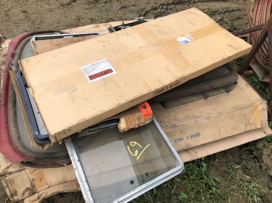Stack of Mack doors and windows. Some new/old stock