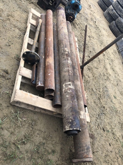 Pallet load of rolling tail boards and pipe.