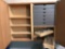 Custom made cabinet with numerous router bits