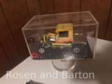 Model of an old Roadster, in elevated display case