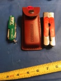 2 Multi Tools, one has a belt pouch