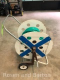 Homelade extremely clean hose reel with hose.