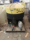 Approx 250 gallons? Stands approx 48 inches tall. On skid. With untested pump