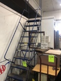 8 ft Industrial rolling ladder.