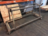 Metal pipe cart. Possible table base on casters?