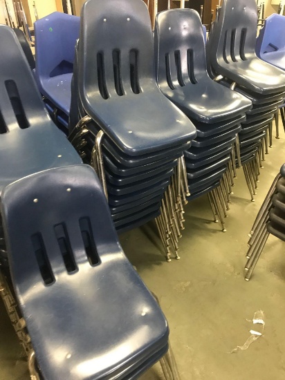 42- Blue plastic school chairs