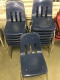 14 blue plastic school chairs