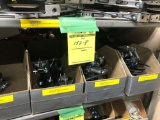 Shelf load of Duct-O-Wire trolley assemblies, collector shoes, clamp assemblies