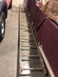 Extremely long wooden vintage ladder