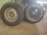 (2) new P235 75R15 Trail Mark tires on rims.