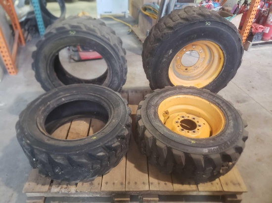4 Skid loader tires 2 with rim 2 without