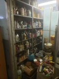Shelves full of lubricants, cleaners, oil, and various fluids